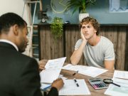 men-sitting-at-the-table