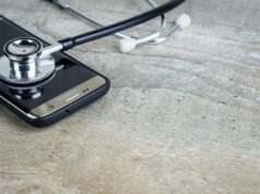 Why Are Health Apps So Costly to Build? a-phone-with-a-stethoscope-on-top-of-it